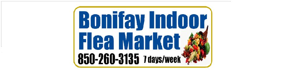 Picture displaying the name of business " Bonifay Indoor Flea Market" in blue letters along with phone number "850-260-3135" and "7 Days a week" both in black letters. Artwork of Mixed fruits and vegetables are displayed in lower right corner.